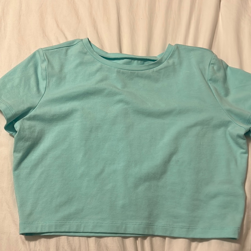 Target baby tee super comfortable and flattering! Sized XL